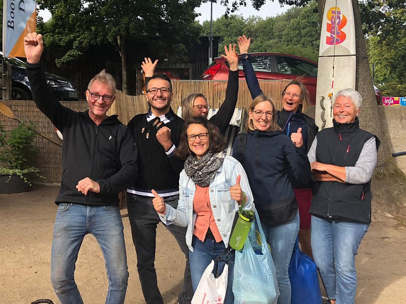Teambild am Strand